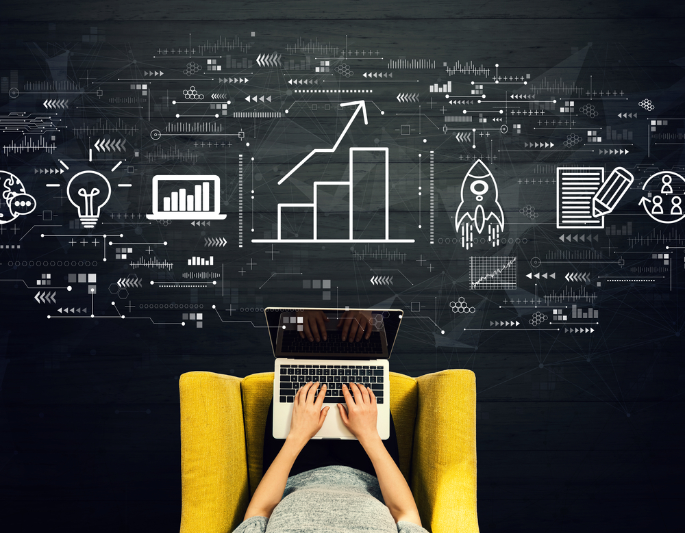 Business,Growth,Analysis,With,Person,Using,A,Laptop,In,A