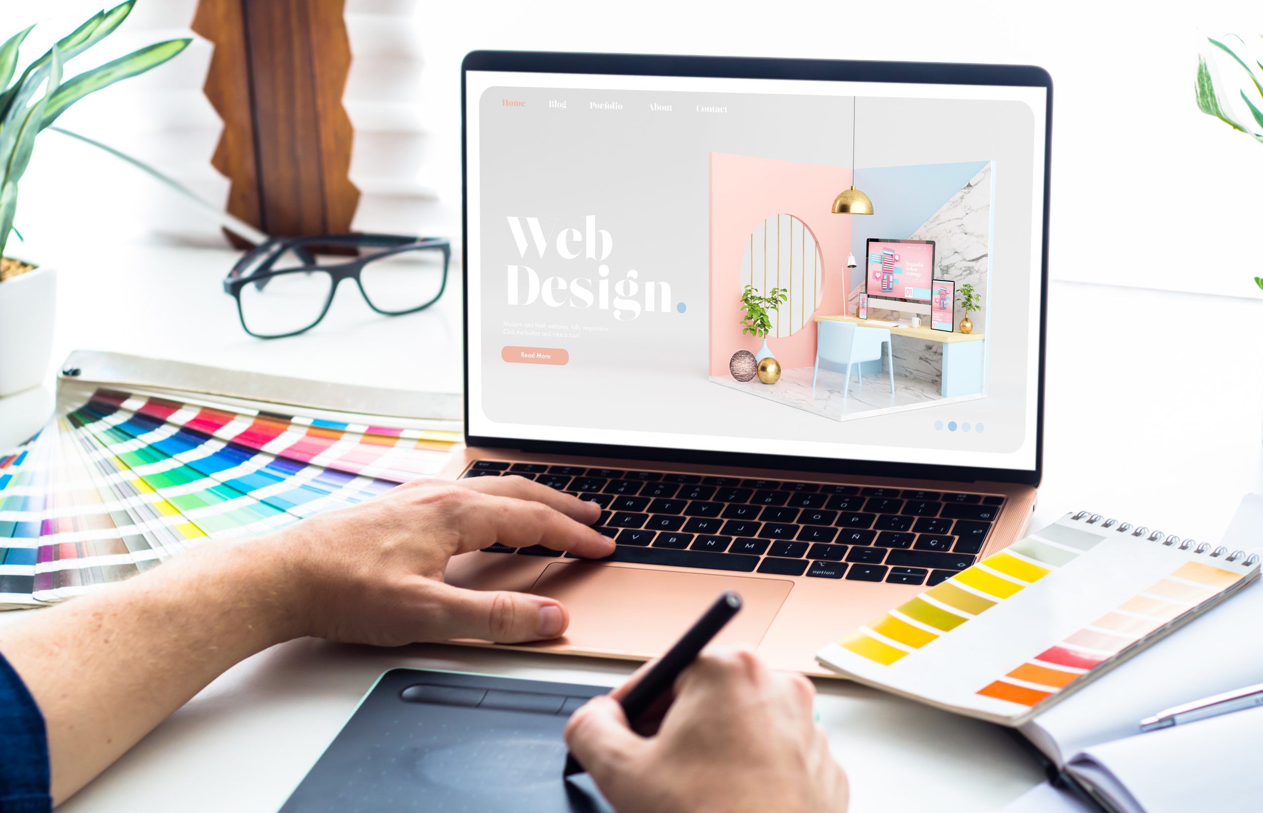 WebDesignDesktopWithLaptopAndTools Why web design is important | IT Vibes