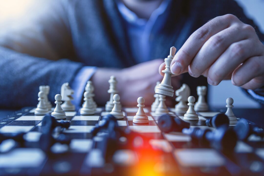 | itvibes full service digital marketing agency in houston Close Up of a Man Moving a Chess Piece on a Chess Board