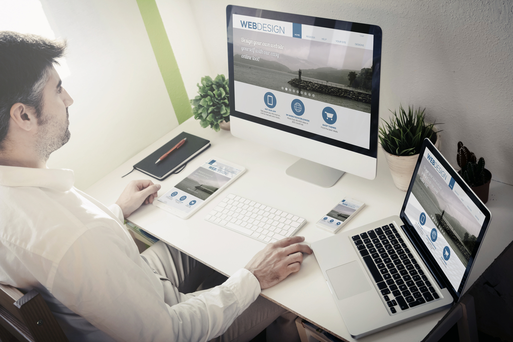 man working on redesigning industrial websites