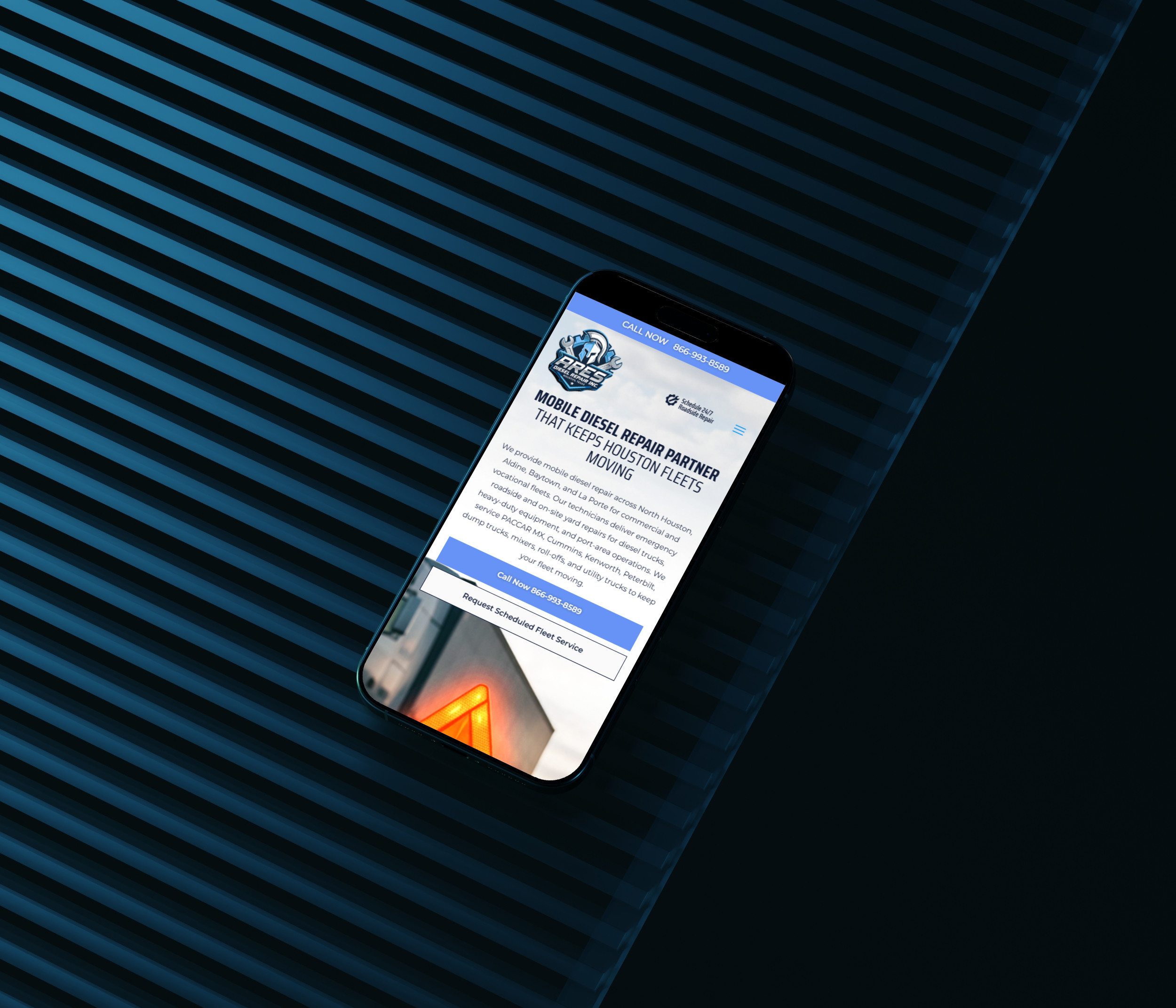 Responsivewebdesignandwebsitemockupdevicesmockupsmartphone | itvibes full service digital marketing agency in houston Smartphone Lying on a Dark Blue Striped Surface Showing a Service Companys Mobile Website with a Blue Header and Text Content