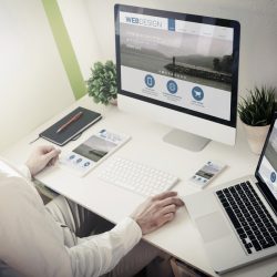 man working on redesigning industrial websites
